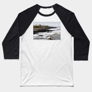 Dunstanburgh castle with rough waves battering the coast in Northumberland, UK Baseball T-Shirt